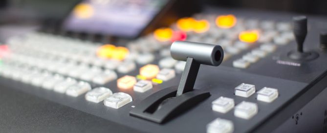 A mixing desk designed to mix and edit audio and video streams during post production.