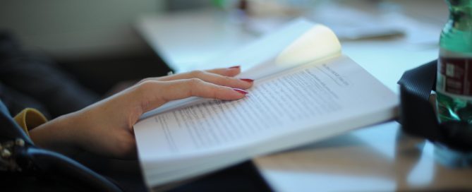 Woman Reading Her Notes
